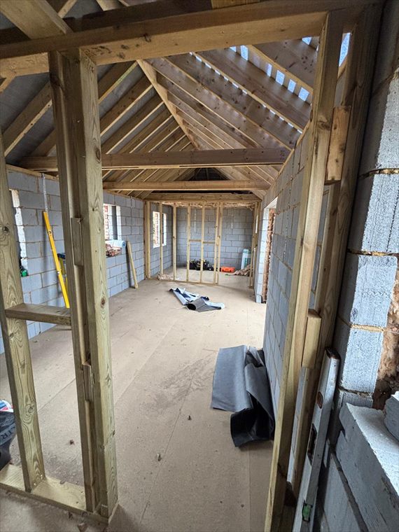 Stud walls forming the new rooms
