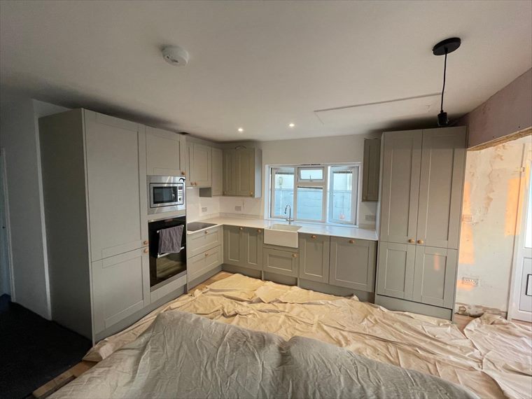 Shaker-style kitchen with integrated appliances