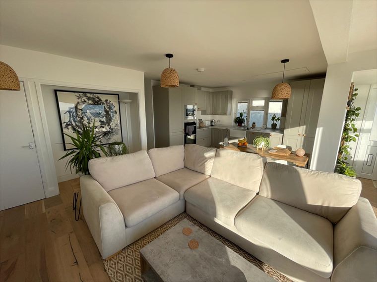 Living area flowing into the kitchen