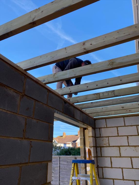 Steel lintel and roof structure