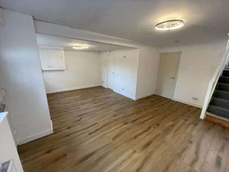 Open-plan room, ready to move into