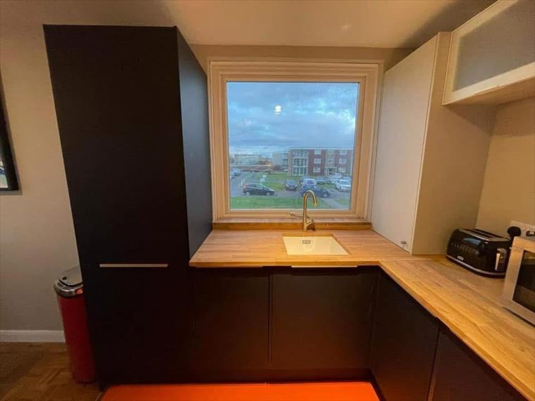 Oak worktops framing the window