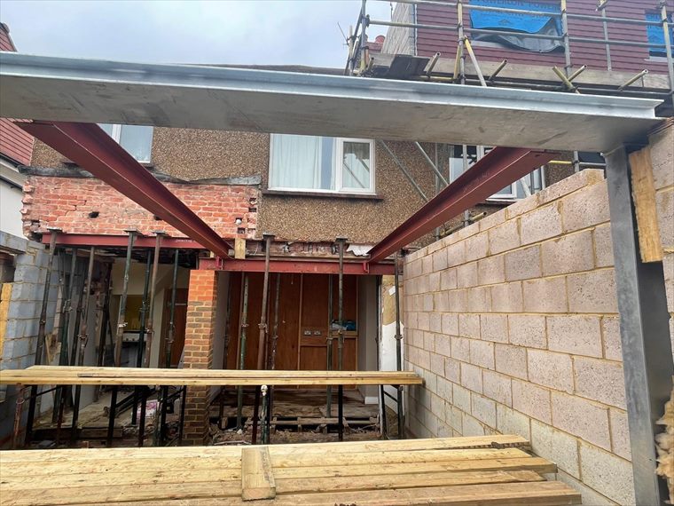 New steel frame opening up the back of the house